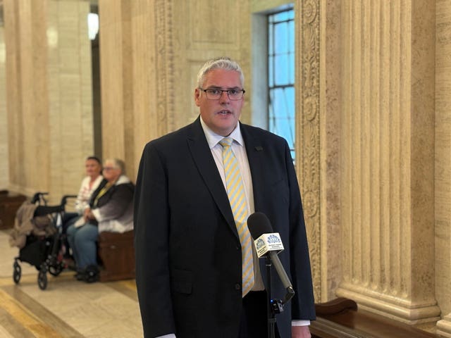 DUP leader Gavin Robinson speaks to the media in the Great Hall of Parliament Buildings