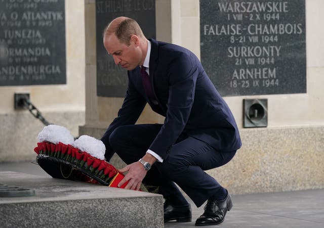 The Prince of Wales lays a wreath at the Tomb of the Unknown Soldier, a monument dedicated to Polish soldiers who lost their lives in conflict, during his visit to Warsaw, Poland