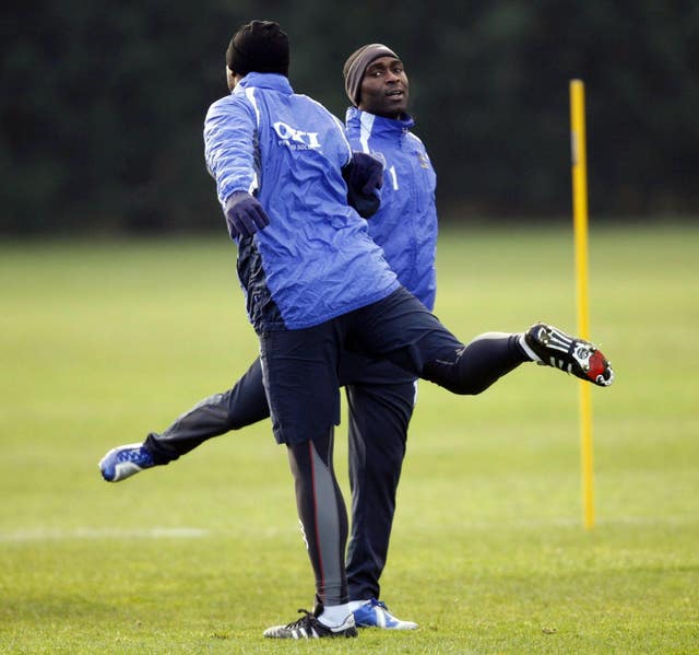 Sol Campbell (left) has attracted his former Portsmouth team-mate Andy Cole to Macclesfield (Chris Ison/PA).