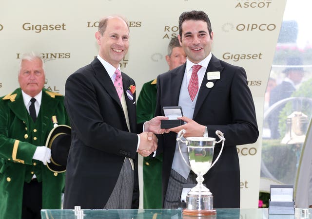 The Earl of Wessex presents the prize for the Duke of Cambridge Stakes to Marco Botti