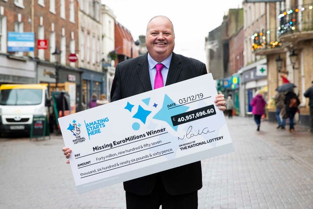Andy Carter, of the National Lottery, appealing in Dorchester, Dorset, for the winner of a EuroMillions jackpot