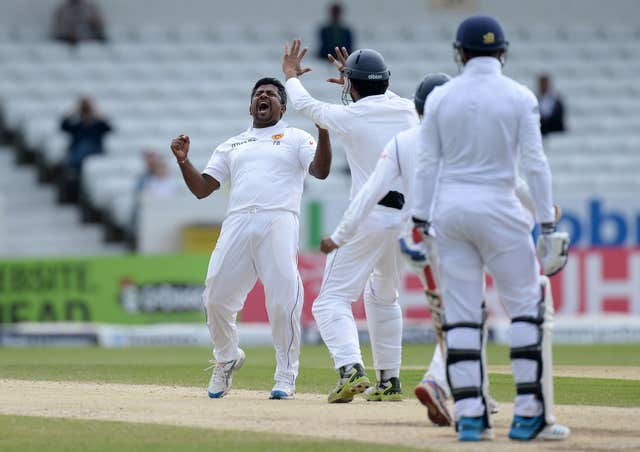 Sri Lanka’s Rangana Herath celebrates a wicket