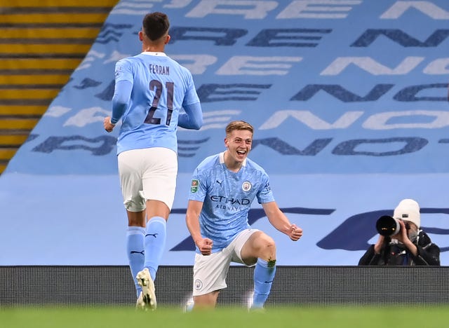 Liam Delap celebrates his opener for City 