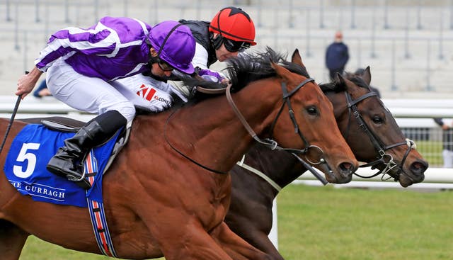 Tough Talk (red cap) edges out Little Big