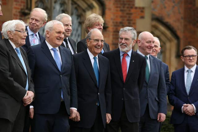 George Mitchell, third left, at the 20th anniversary of the Good Friday Agreement