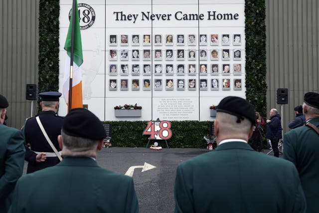 People pay their respects over the deadly Stardust fire