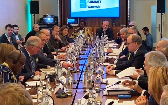 The Prince of Wales sits opposite Prince Albert of Monaco at the WaterAid charity’s Water and Climate event in London. Albert later tested positive for coronavirus. PA/Wire