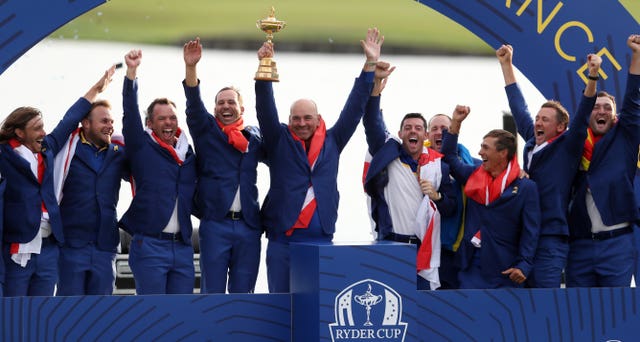 Team Europe captain Bjorn lifts the trophy