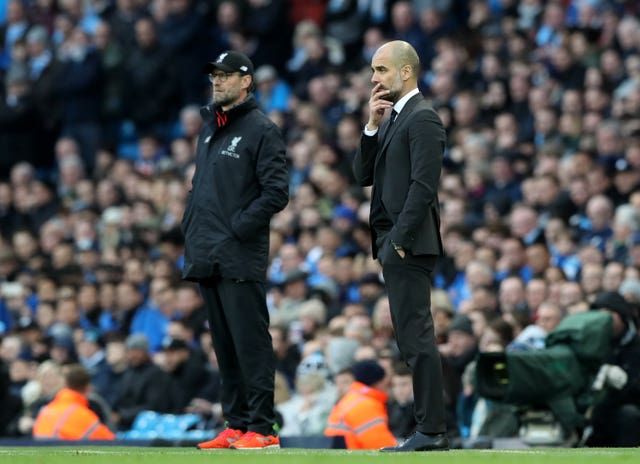 Liverpool manager Jurgen Klopp (left) and Manchester City manager Pep Guardiola have faced each other numerous times