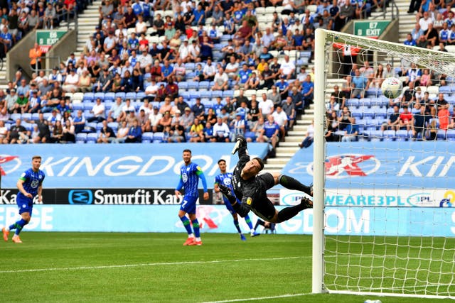 Lee Evans scores from distance as Wigan beat Championship new boys Cardiff on the opening weekend of the EFL season