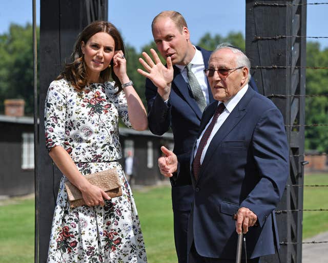 William and Kate, then the Duke and Duchess of Cambridge, with Manfred Goldberg at the former Nazi concentration camp at Stutthof, near Gdansk, Poland