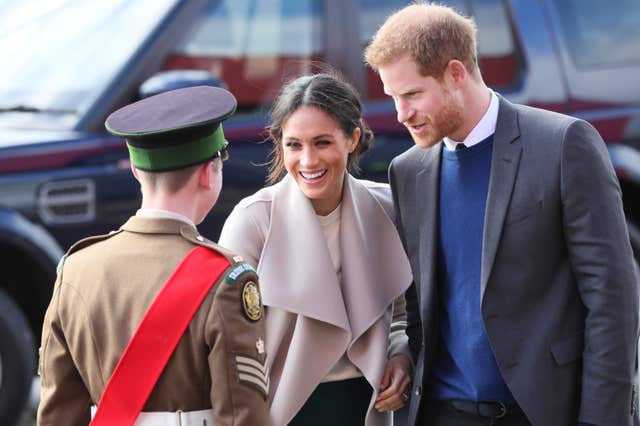 Prince Harry and Meghan Markle at the Eikon Centre , built on the site of the old Maze prison (Brian Lawless/PA)