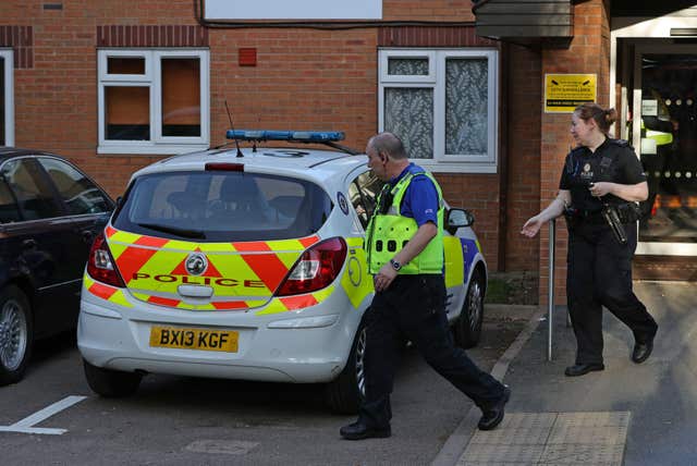 Police outside a home in the West Midlands