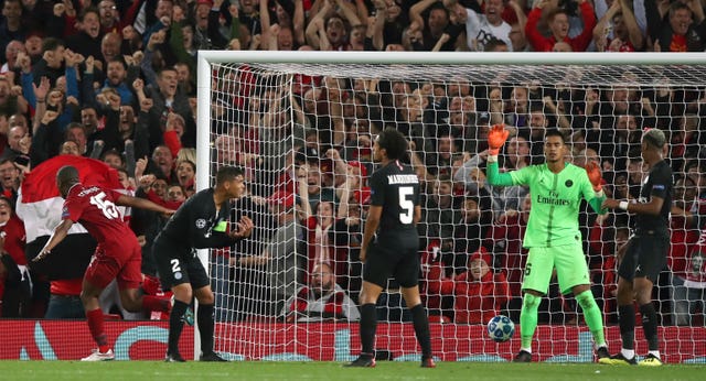 Daniel Sturridge, left, celebrates after heading Liverpool in front