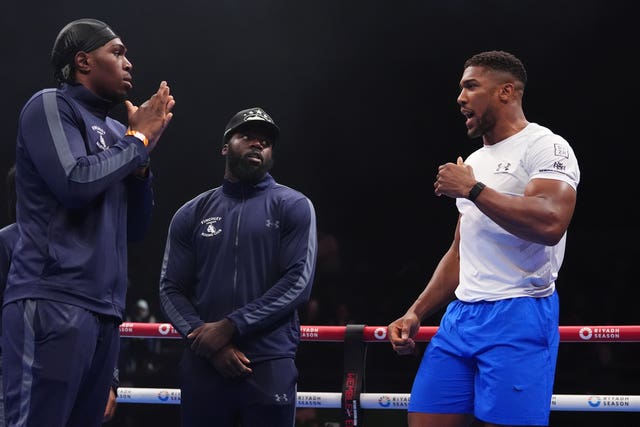 Joshua (right) with members of the Finchley Boxing Club