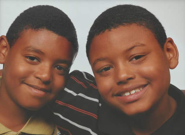 Tavis Spencer-Aitkens, right, and his twin brother Tyler