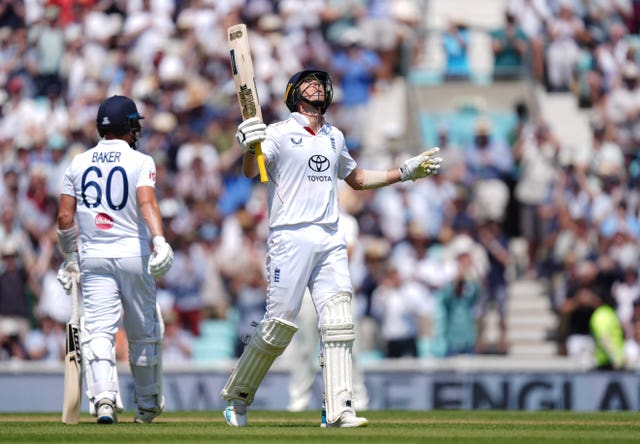 England’s Matt Fisher celebrates his half-century against New Zealand