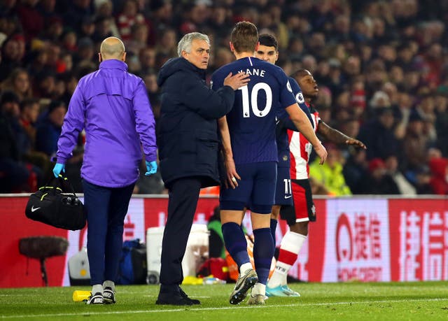 Mourinho (centre) is unsure how severe Kane's injury is 