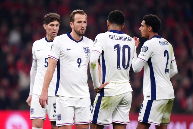 England’s Harry Kane celebrates with team-mates after his second goal