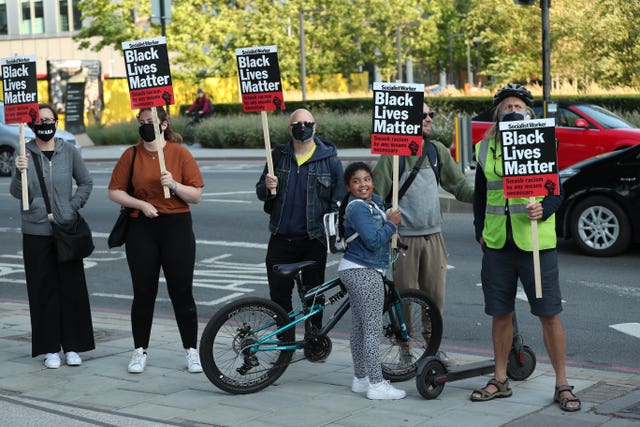 Protesters outside the US embassy in London as part of an anti-racism demonstration 