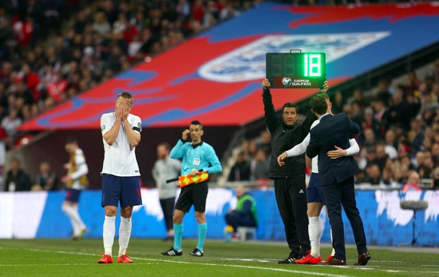 Eric Dier reacts as he is substituted early on