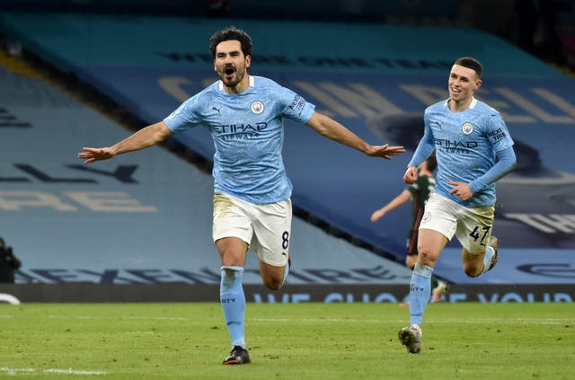 Ilkay Gundogan players with Kyle Walker at Manchester City