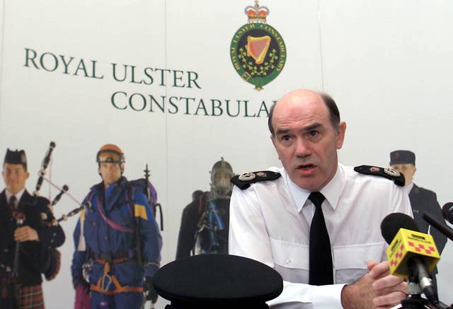 Sir Ronnie Flanagan speaks to journalists