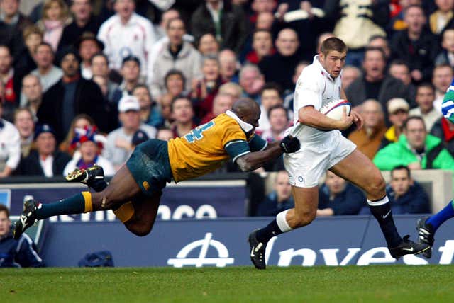 England's Ben Cohen (right) is tackled by Australia's Wendell Sailor during an international friendly at Twickenham. England claimed an eventual 21-15 victory