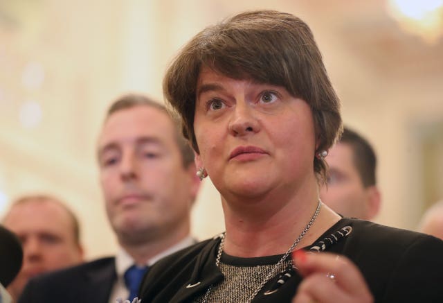 Arlene Foster and her DUP MLAs leaving the chamber of Stormont