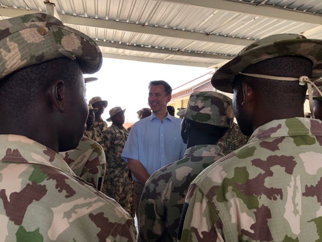 Foreign Secretary Jeremy Hunt at the World Food Programme distribution centre in Maiduguri