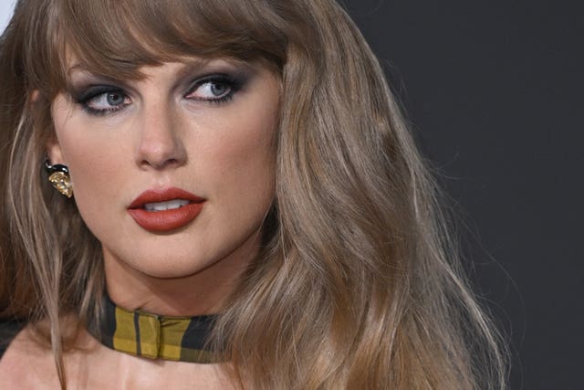 Headshot of Taylor Swift, looking to her left