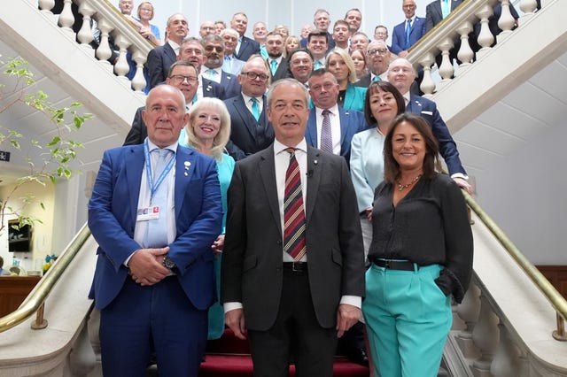 Nigel Farage flanked by new Kent councillors