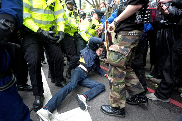 Police remove a protester 