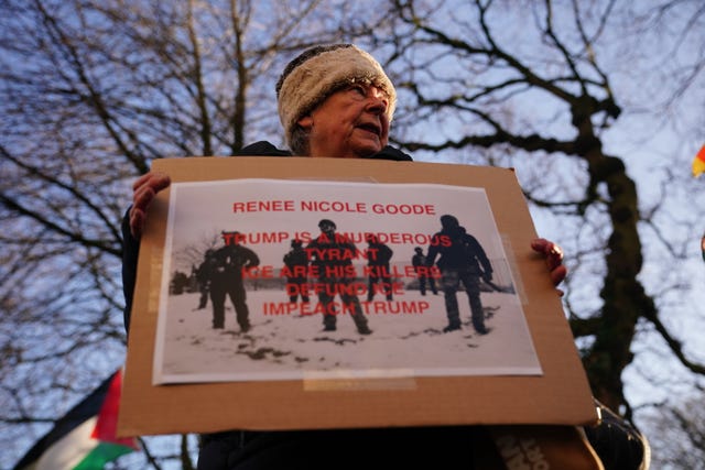 People attend a protest outside the US consulate in Edinburgh