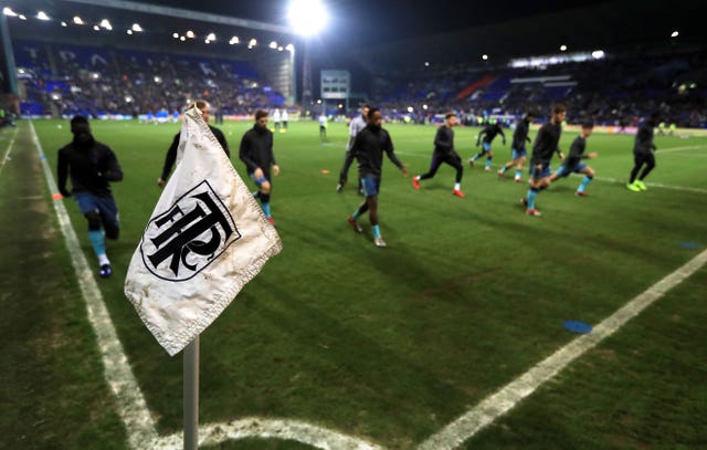 Tottenham players warm up at Tranmere