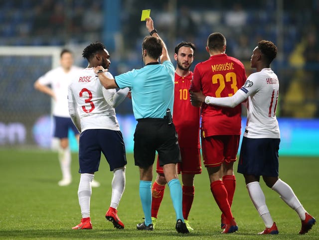 Danny Rose (left) was shown a yellow card