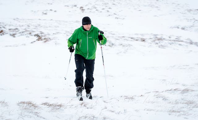 A Cross-country skier in snowy conditions near Buttertubs Pass in the Yorkshire Dales National Park (Danny Lawson/PA)