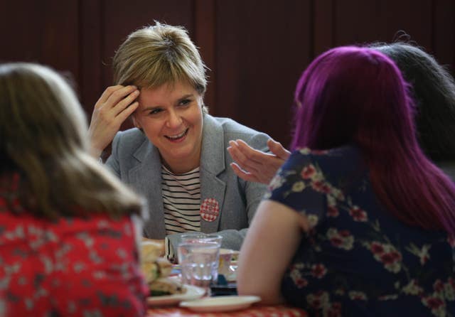 First Minister Nicola Sturgeon attending a Great Get Together event at Glasgow Women's Library last year (David Cheskin/PA)