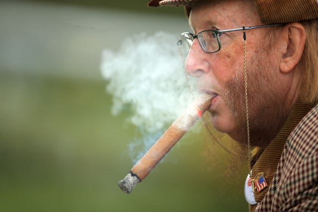 John McCririck believes bookmakers can withstand a short-term postponement of racing