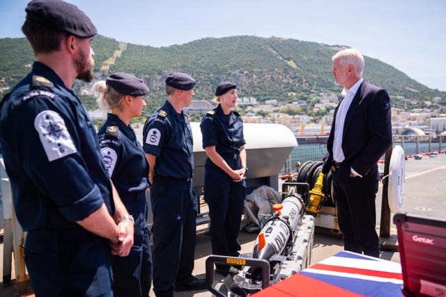 Al Carns chatting to sailors on board RFA Lyme Bay