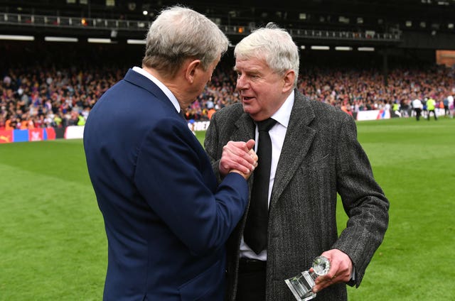John Motson is congratulated by Crystal Palace boss Roy Hodgson after his final commentary for the BBC