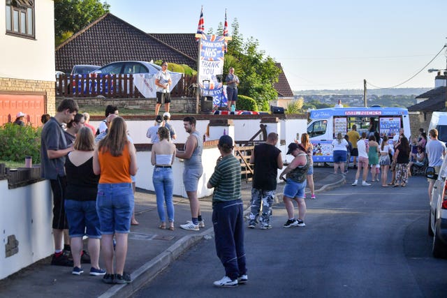 Joshua Morton leads the applause in the St George area of Bristol