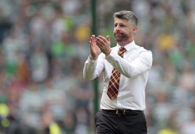 Motherwell’s Stephen Robinson applauds the Steelmen''s supporters at full-time