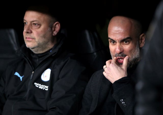 Pep Guardiola, right, shocked many with his team selection