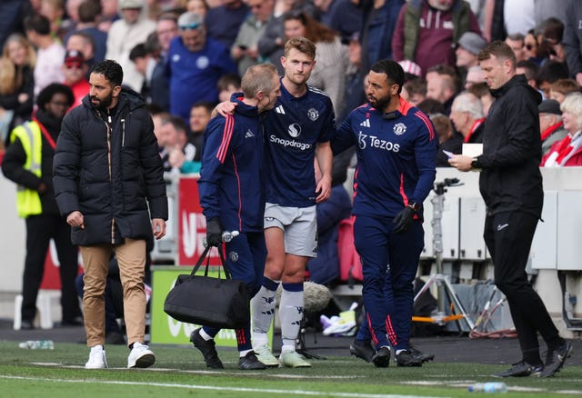 Manchester United defender Matthijs de Ligt walks off the pitch with an injury