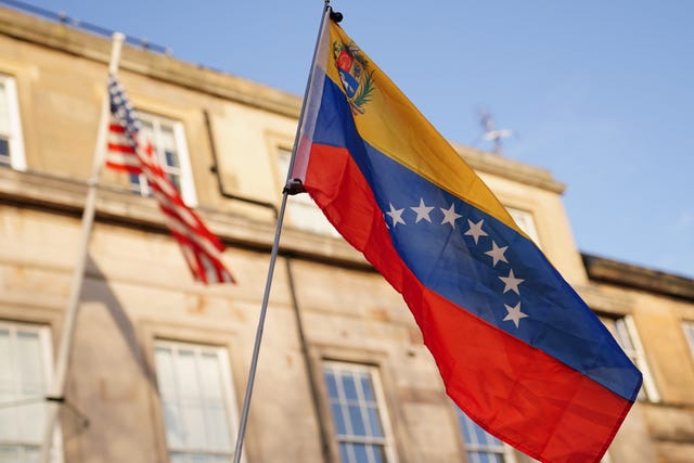 A Venezuelan flag flies during a protest