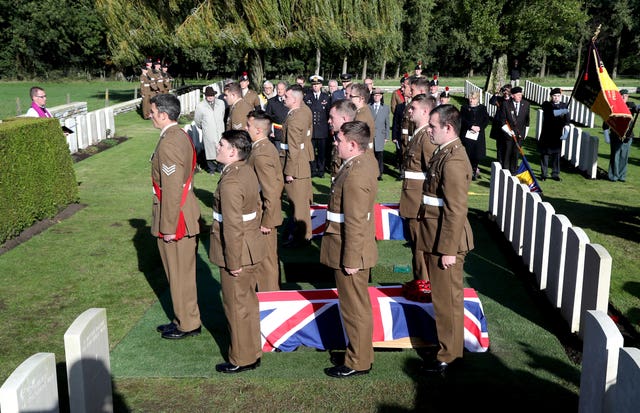 Coffins arrive for a burial service at the Commonwealth War Graves Commission’s Wytschaete Military Cemetery, near Ypres, Belgium