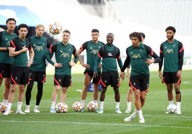 Trent Alexander-Arnold, front right, and Liverpool train on the pitch at the Stade de France