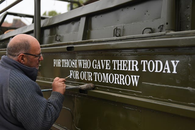 Volunteer Garry Featherstone adds the finishing touches