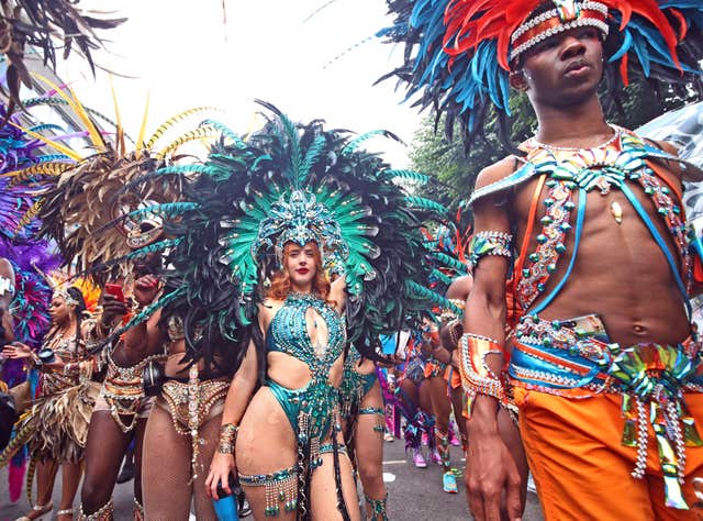 Dancers at the Notting Hill Carnival in west London (Yui Mok/PA)